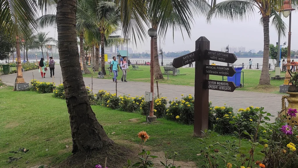 Landscaped lakefront promenade with walkways and gardens