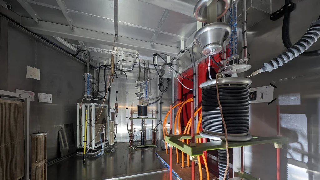 High-voltage test cage inside an electrical laboratory